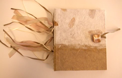 Hand-made book with gold ribbons